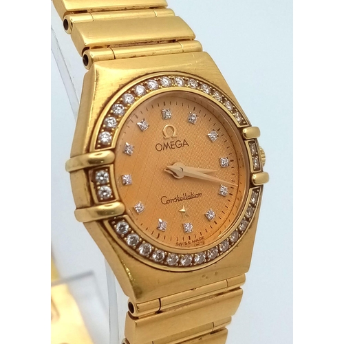 114 - An Omega 18K Yellow Gold Constellation Ladies Watch. 18K gold bracelet and case - 23mm. Gold tone di... 