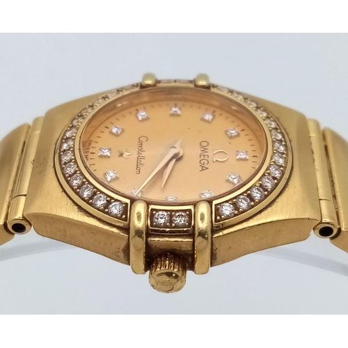 114 - An Omega 18K Yellow Gold Constellation Ladies Watch. 18K gold bracelet and case - 23mm. Gold tone di... 