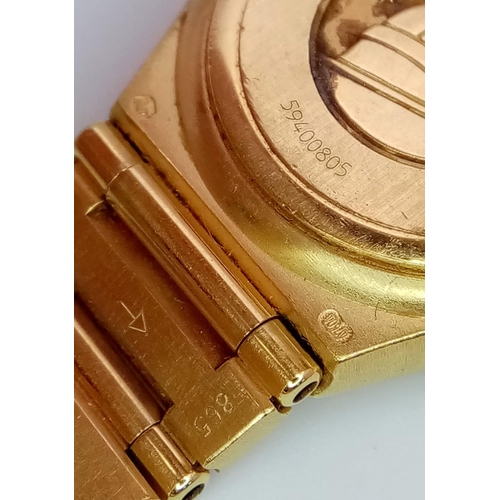 114 - An Omega 18K Yellow Gold Constellation Ladies Watch. 18K gold bracelet and case - 23mm. Gold tone di... 