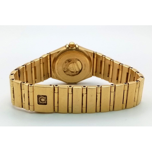 114 - An Omega 18K Yellow Gold Constellation Ladies Watch. 18K gold bracelet and case - 23mm. Gold tone di... 