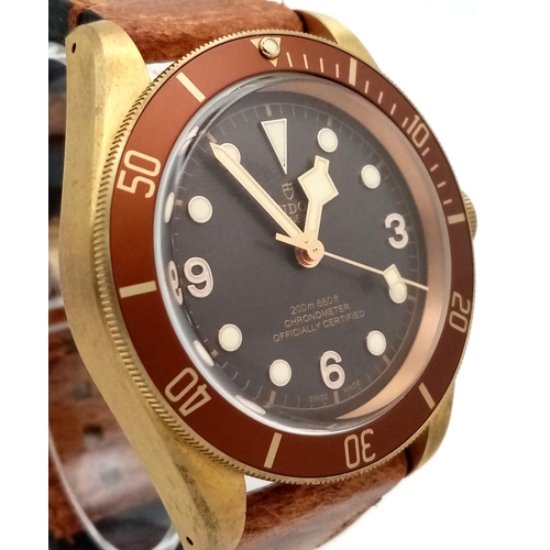 16 - A Tudor Black Bay 58 Automatic Gents Watch. Brown leather strap. Gold plated case - 43mm. Rich choco... 