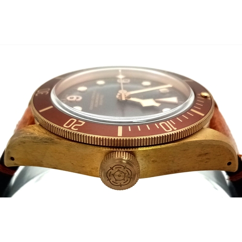 16 - A Tudor Black Bay 58 Automatic Gents Watch. Brown leather strap. Gold plated case - 43mm. Rich choco... 