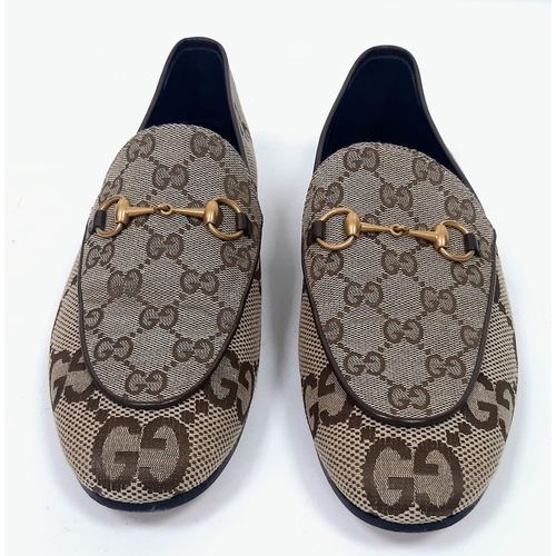 162 - Gucci Women's MAXI Jordaan Loafers.
GG monogram patterning, quality leather and gold tone hardware. ... 