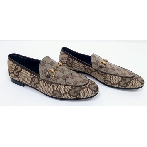 162 - Gucci Women's MAXI Jordaan Loafers.
GG monogram patterning, quality leather and gold tone hardware. ... 