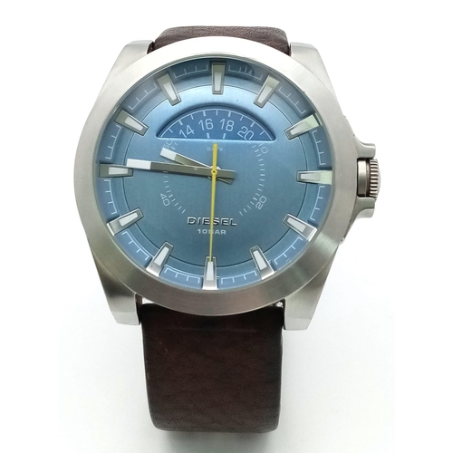 606 - A Very Good Condition Men’s Diesel Blue Face Crescent Design Date Quartz Watch. 50mm Including Crown... 