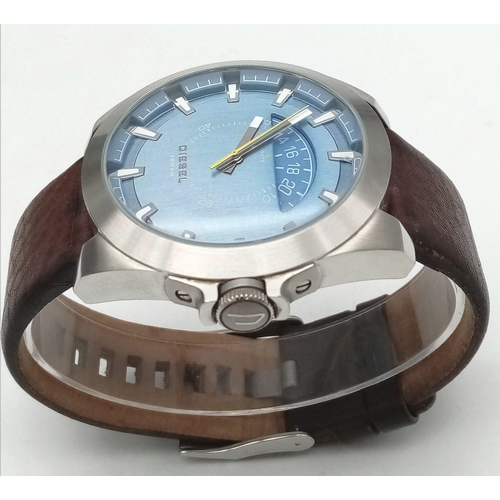 606 - A Very Good Condition Men’s Diesel Blue Face Crescent Design Date Quartz Watch. 50mm Including Crown... 