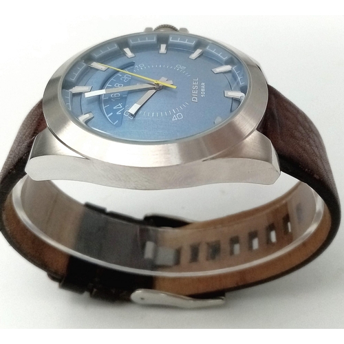 606 - A Very Good Condition Men’s Diesel Blue Face Crescent Design Date Quartz Watch. 50mm Including Crown... 