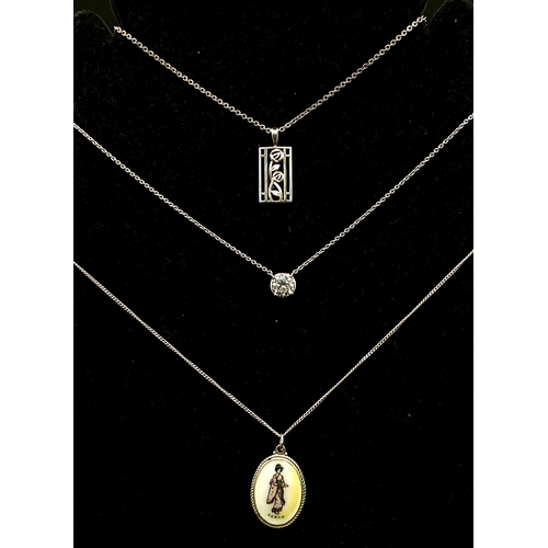 910 - Sterling silver selection of 3 necklaces with pendants, see photos for designs and conditions.