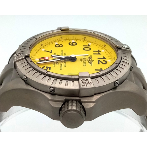 157 - A Breitling Avenger Seawolf Titanium Gents Watch. Titanium bracelet and case - 45mm. Yellow dial wit... 