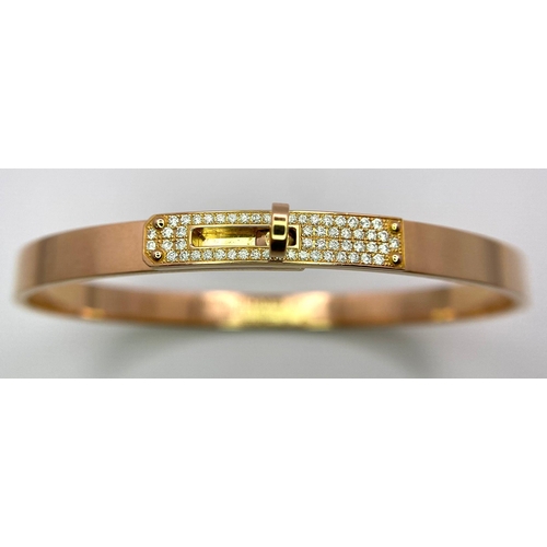 17 - A Hermes Kelly Bracelet in 18k Rose Gold with 61 Sparkling White Diamonds. Interior Circumference 6.... 