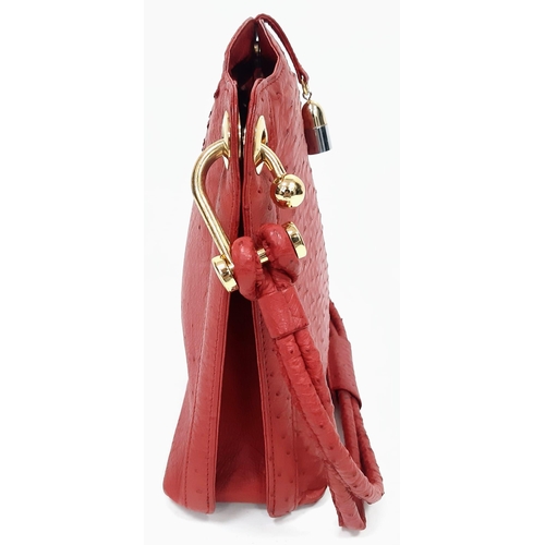 499 - Vintage Red Sabatini Ostrich Leather Handbag.
Feels amazing to the touch, gold tone chunky hardware ... 