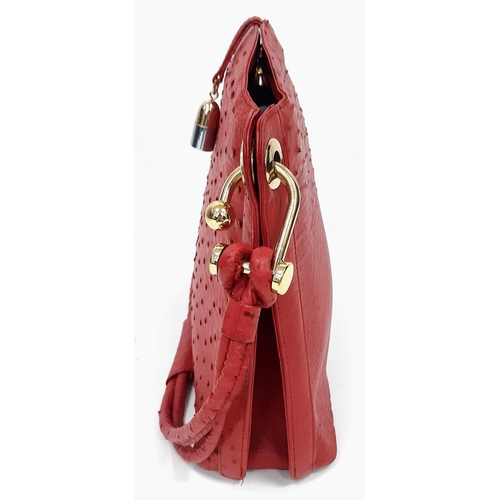 499 - Vintage Red Sabatini Ostrich Leather Handbag.
Feels amazing to the touch, gold tone chunky hardware ... 