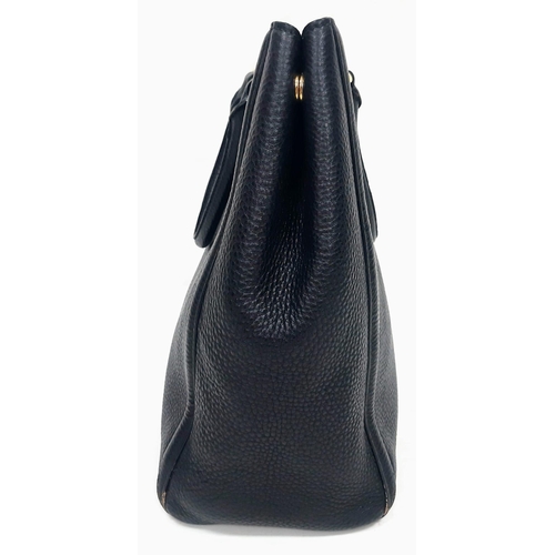 506 - Black PRADA Vitello Daino Handbag.
Luxurious leather, double handle open-top with quality gold tone ... 