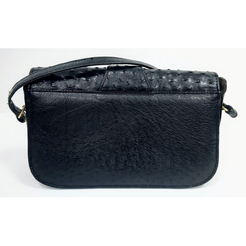 520 - Vintage Corbeau Ostrich Leather Handbag.
Circa 1970s, this wonderful handbag oozes elegance. Measuri... 