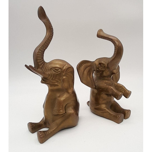 842 - Pair of Antique Brass Lucky Elephants.
This wonderful pair could be used as bookends or lucky home o... 