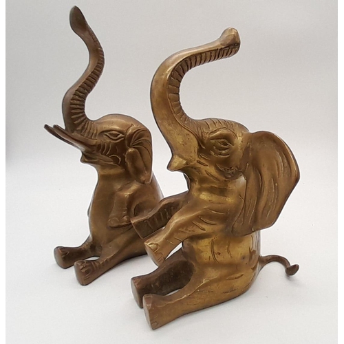 842 - Pair of Antique Brass Lucky Elephants.
This wonderful pair could be used as bookends or lucky home o... 