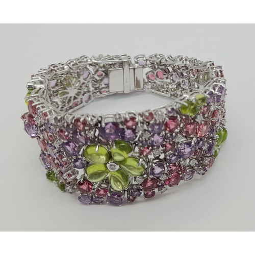 177 - A STUNNING DIAMOND AND MULTI GEMSTONE BRACELET SET IN 18K WHITE GOLD  .APPROX 17cms    52gms   01116... 