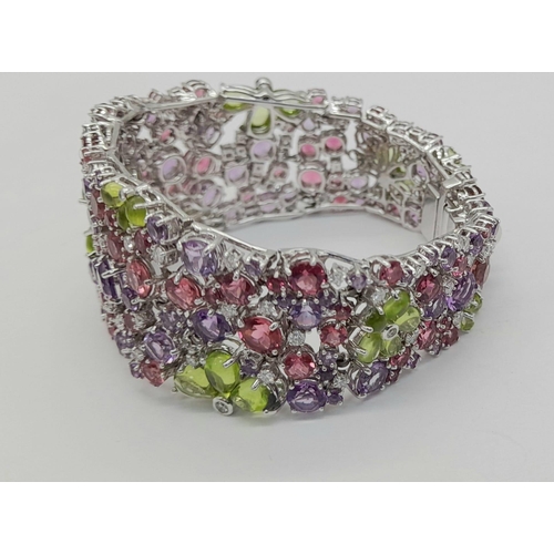 177 - A STUNNING DIAMOND AND MULTI GEMSTONE BRACELET SET IN 18K WHITE GOLD  .APPROX 17cms    52gms   01116... 