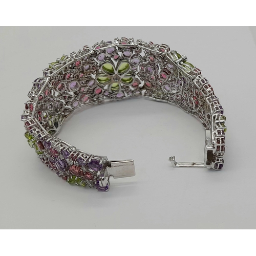 177 - A STUNNING DIAMOND AND MULTI GEMSTONE BRACELET SET IN 18K WHITE GOLD  .APPROX 17cms    52gms   01116... 