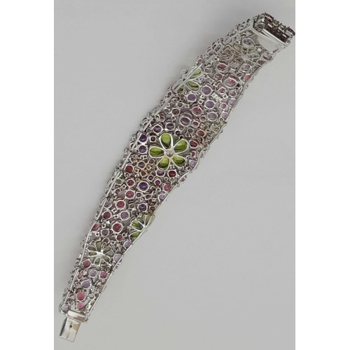 177 - A STUNNING DIAMOND AND MULTI GEMSTONE BRACELET SET IN 18K WHITE GOLD  .APPROX 17cms    52gms   01116... 