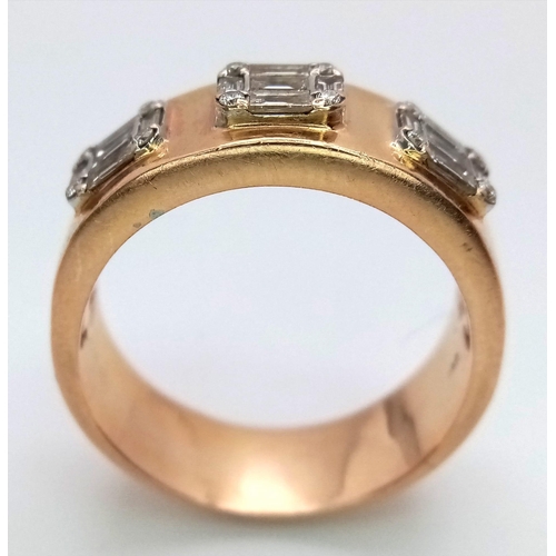 312 - An 18K Rose Gold Diamond Gents Ring. Three sections of baguette and round cut diamonds symbolizing t... 