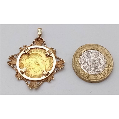 365 - A 9 K yellow gold pendant with a King George V sovereign, total weight: 7.7 g