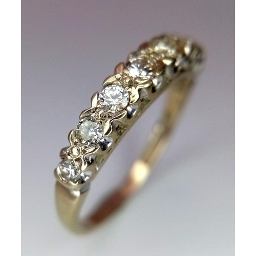 731 - AN 18K GOLD RING WITH EIGHT GRADUATED DIAMONDS TO THE TOP .  3.1gms   size O        13691