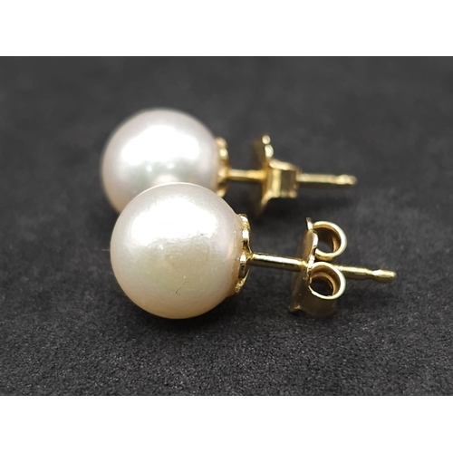 1722 - A Pair of 18K Yellow Gold South Sea Pearl Stud Earrings. 8mm pearls. 4g total weight. Ref: 12667