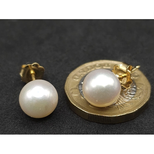 1722 - A Pair of 18K Yellow Gold South Sea Pearl Stud Earrings. 8mm pearls. 4g total weight. Ref: 12667