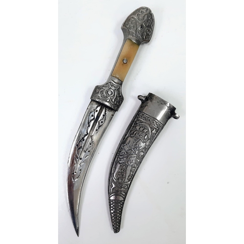 457 - A Vintage or Antique Silver or White Metal Arabic Dagger with Bone Inlay Handle. 21.5cm Length.
209 ... 