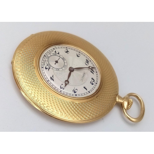 192 - An Asprey of London 18K Yellow Gold Slimline Pocket Watch. 
Engine turn pattern with engraved cartou... 