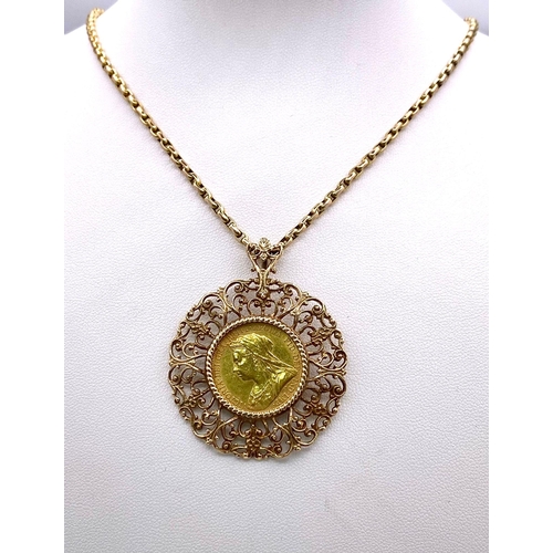 120 - A 9 K yellow gold very artistic pendant with a full gold sovereign of Queen Victoria 1895, on a subs... 