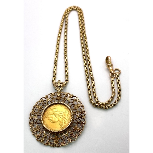 120 - A 9 K yellow gold very artistic pendant with a full gold sovereign of Queen Victoria 1895, on a subs... 