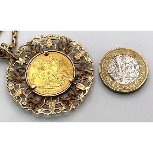 120 - A 9 K yellow gold very artistic pendant with a full gold sovereign of Queen Victoria 1895, on a subs... 