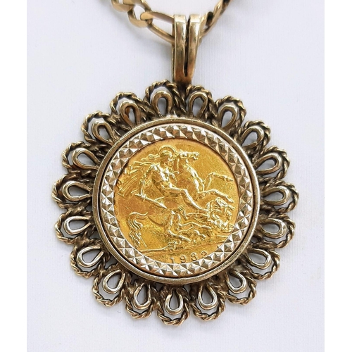 141 - A 9 K yellow gold elaborate pendant with a full sovereign of Queen Elizabeth II 1982, on a 9 K yello... 