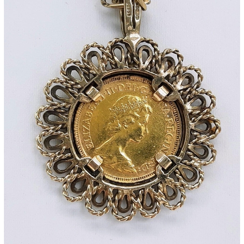 141 - A 9 K yellow gold elaborate pendant with a full sovereign of Queen Elizabeth II 1982, on a 9 K yello... 