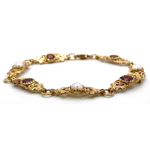 1721 - An Antique Style 9K Yellow Gold, Garnet and Pearl Bracelet. 
16cm. 5.67g total weight. Ref: 14665