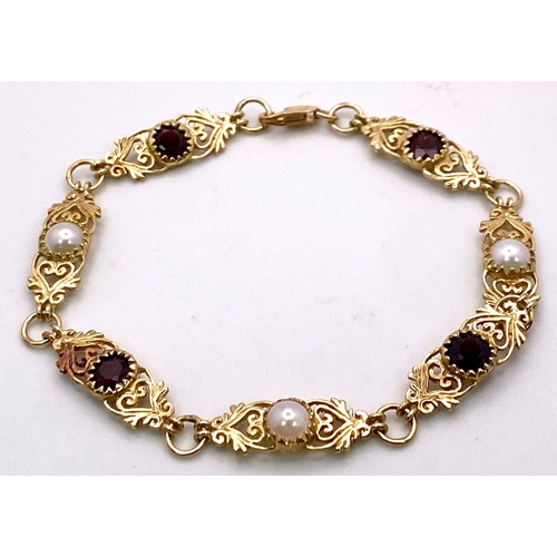 1721 - An Antique Style 9K Yellow Gold, Garnet and Pearl Bracelet. 
16cm. 5.67g total weight. Ref: 14665