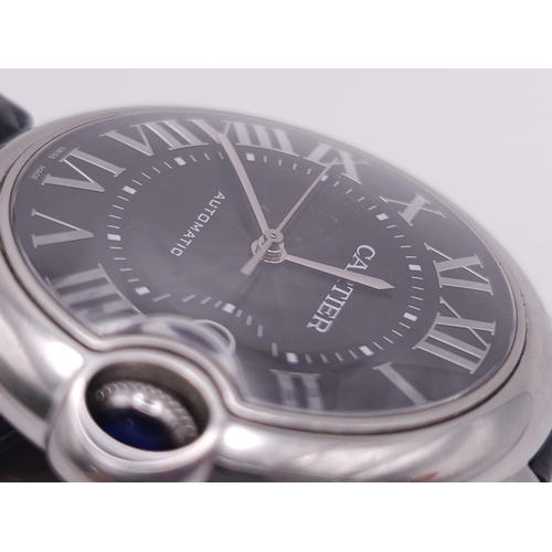 178 - A Cartier Balloon Bleu Automatic Gents Watch. Black leather strap. Stainless steel case - 42mm. Blac... 