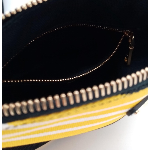 339 - A Prada Yellow, Black and White Pouch. Textile exterior, with gold tone hardware and top zip, and th... 