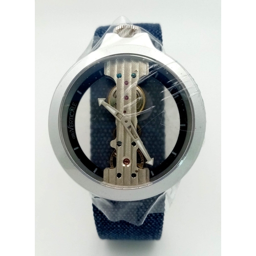 588 - Atto Verticale Masera Mechanical Skeleton Watch.
Denim feel Leather strap with a pale blue underside... 