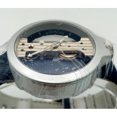 588 - Atto Verticale Masera Mechanical Skeleton Watch.
Denim feel Leather strap with a pale blue underside... 