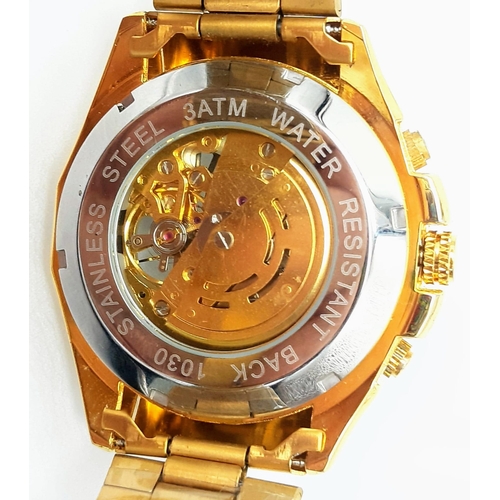 901 - An Unworn Men’s, Royal Oak Style, Gold Tone, Skeleton Front and Back Automatic Watch by Forsinning. ... 