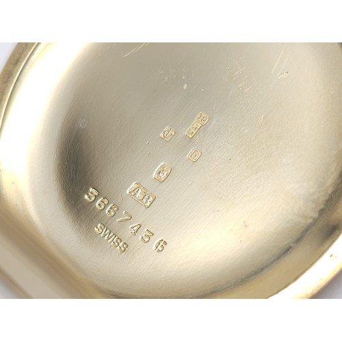 192 - An Asprey of London 18K Yellow Gold Slimline Pocket Watch. 
Engine turn pattern with engraved cartou... 