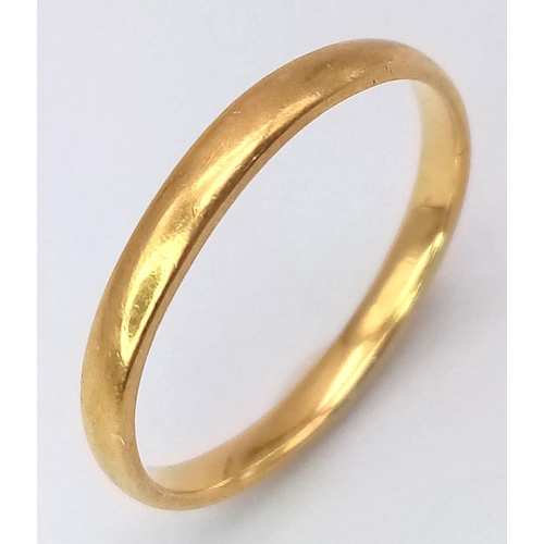 22 - A 22K Yellow Gold Band Ring. Full UK hallmarks. Size K. 1.85g weight.