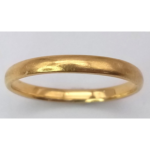 22 - A 22K Yellow Gold Band Ring. Full UK hallmarks. Size K. 1.85g weight.