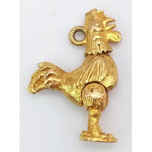 46 - A 9K Yellow Gold Articulated Cock Charm/Pendant. 2cm. 3.33g weight.