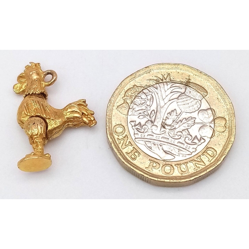 46 - A 9K Yellow Gold Articulated Cock Charm/Pendant. 2cm. 3.33g weight.