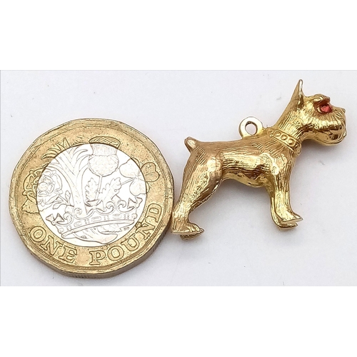 48 - A Vintage 9K Yellow Gold Boxer Dog with Garnet Eyes Pendant/Charm. 25mm length. 4.96g weight.