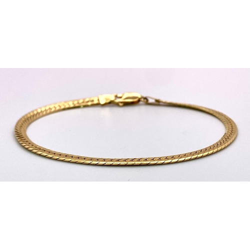 6 - A 10k Yellow Gold Herringbone Bracelet. 17cm. 5g weight.
